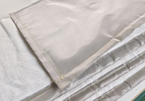 Reinforced stitching detail of industrial thermal insulation curtain for long-lasting performance